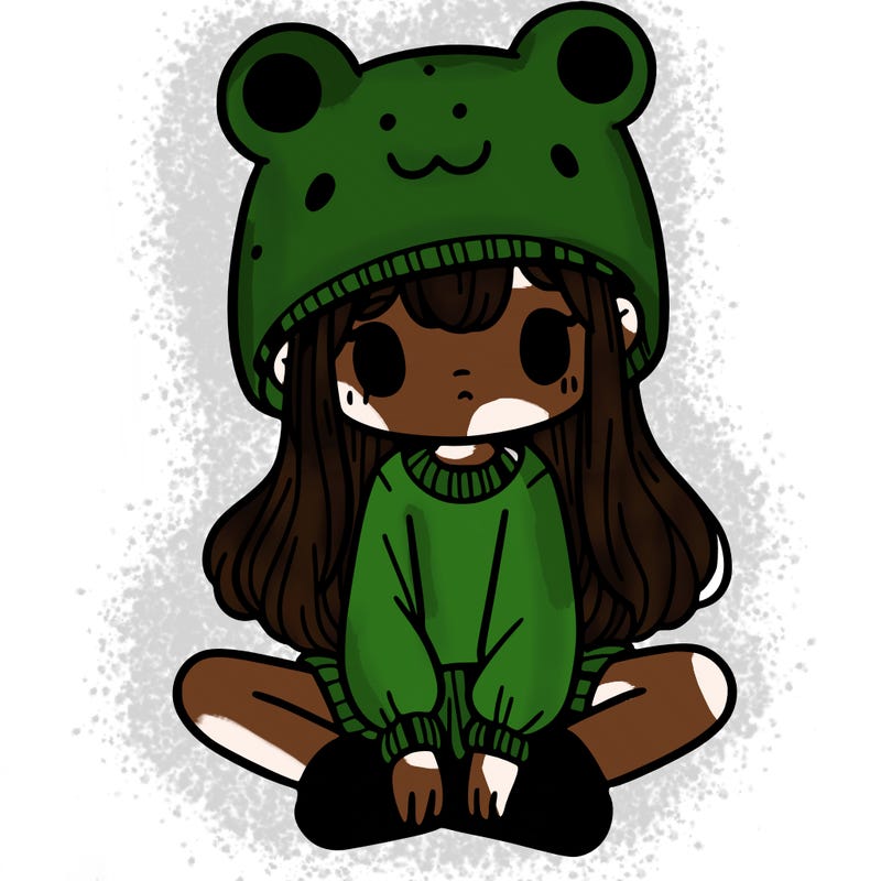 a girl wearing a frog hat and some frog socks