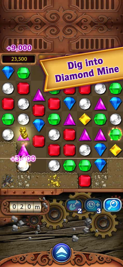 Jugabilidad del modo Diamond Mine de Bejeweled Classic que muestra una cuadrícula de gemas coloridas y pepitas de oro