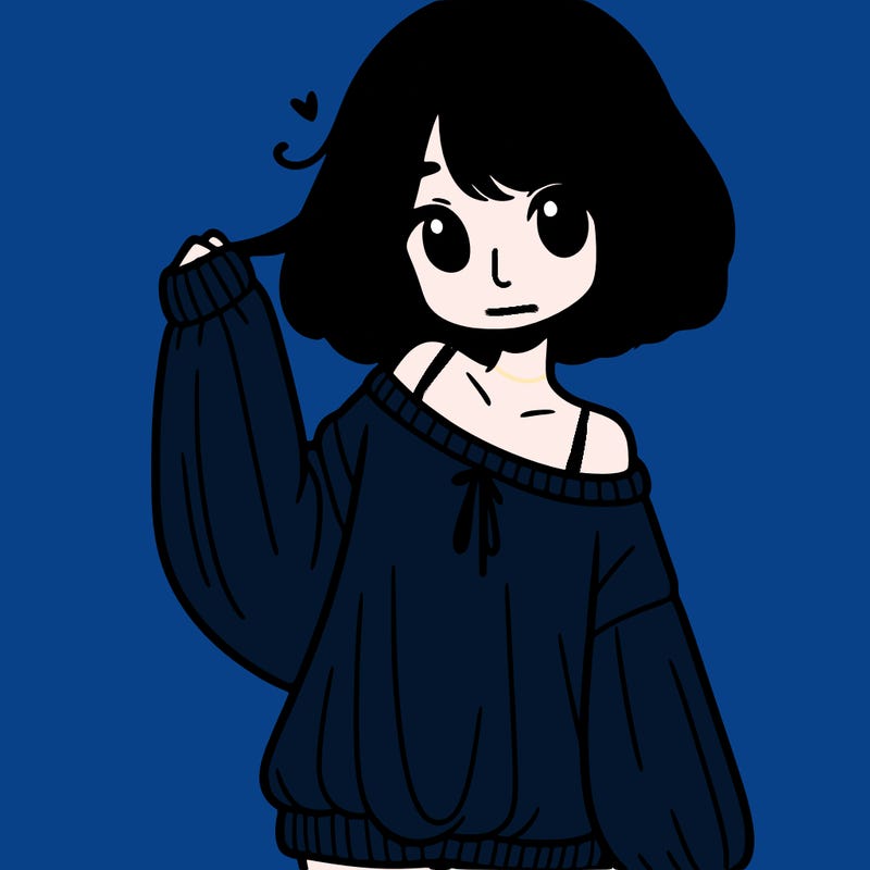 girl in baggy sweater hanging off her shoulder