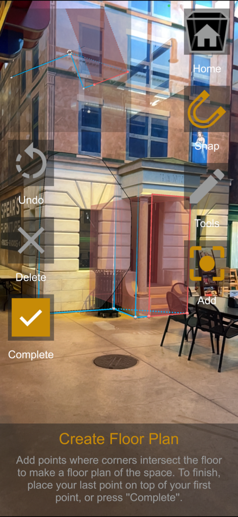 A3d Scanner 앱 인터페이스가 무대 세트의 모서리 포인트를 매핑하여 증강 현실 평면도 생성을 보여줍니다.