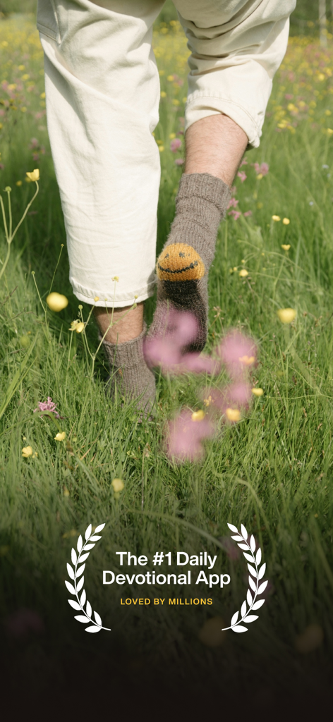 A person walking through a grassy meadow with text stating Glorify is the number one daily devotional app