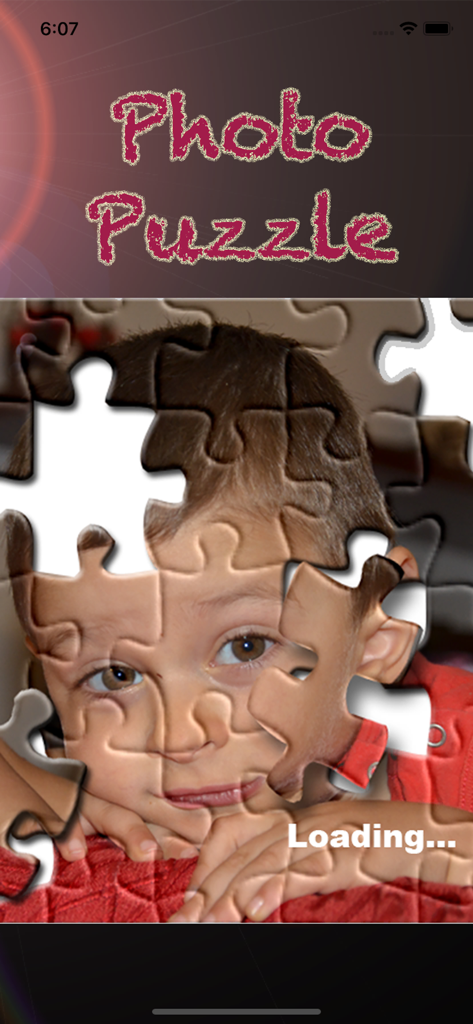 PhotoPuzzle with your photos - Loading screen showing a jigsaw puzzle created from a personal photo of a child
