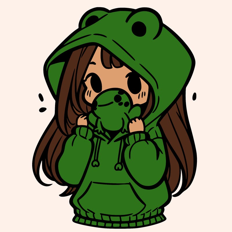 a girl holding a froggy hoodie