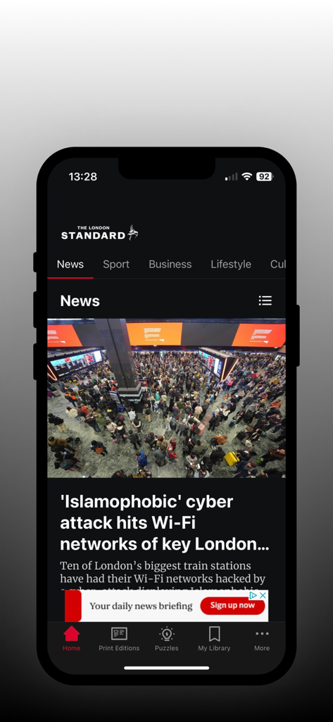 The London Standard - The London Standard mobile app interface showing a news article with a headline about a cyber attack on London train stations.