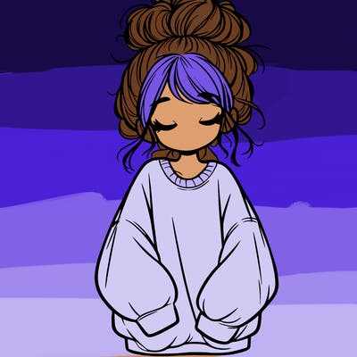 girl with baggy sweatshirt and messy bun