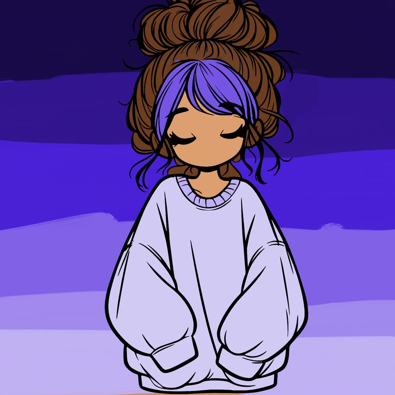 girl with baggy sweatshirt and messy bun