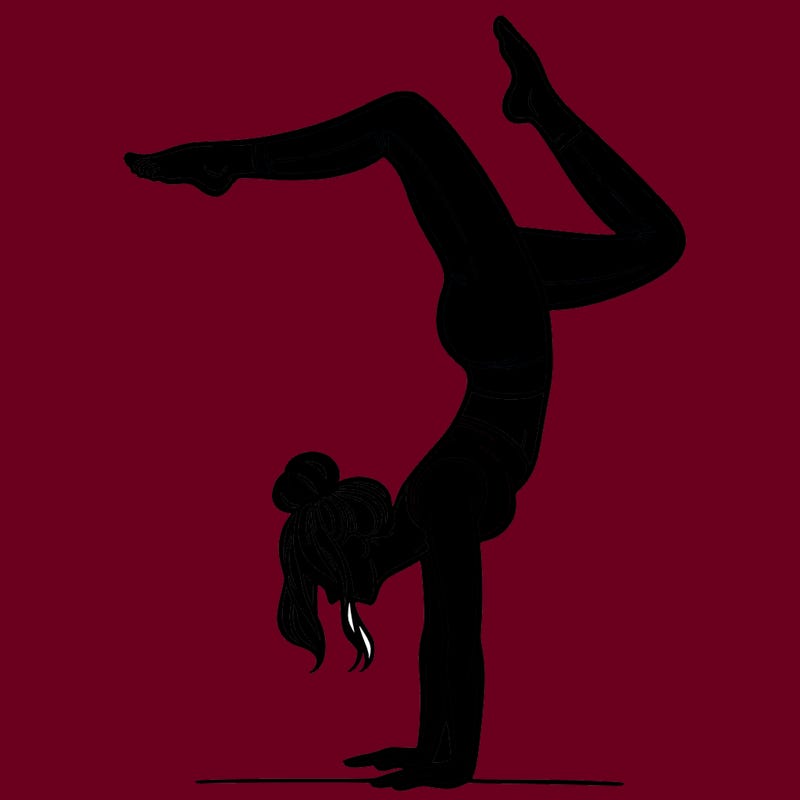 a woman doing a handstand