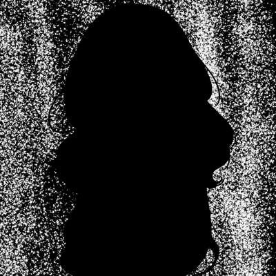 shy pretty girl wearing a sweater that is falling off one shoulder portrait