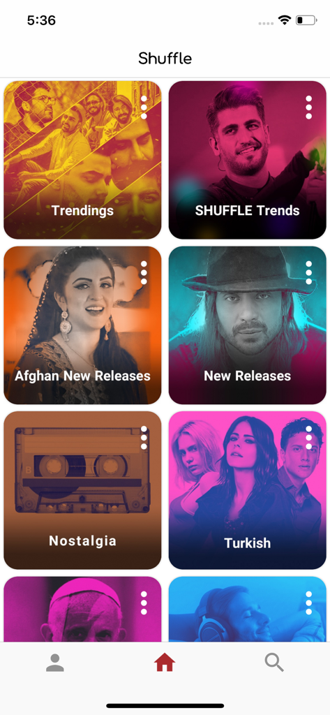 Shuffle Music - Shuffle Music app screen showing a grid of curated channels like Afghan New Releases Turkish and Nostalgia