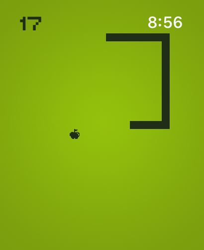 Snake - Classic - Gameplay of Snake Classic showing a pixelated snake and apple on a green background.