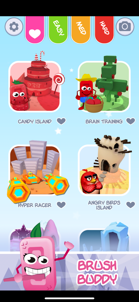 PEZ Play - Ecrã que mostra o menu da aplicação PEZ Play com vários minijogos, filtros de nível de dificuldade e a funcionalidade de escovagem de dentes Brush Buddy na parte inferior.