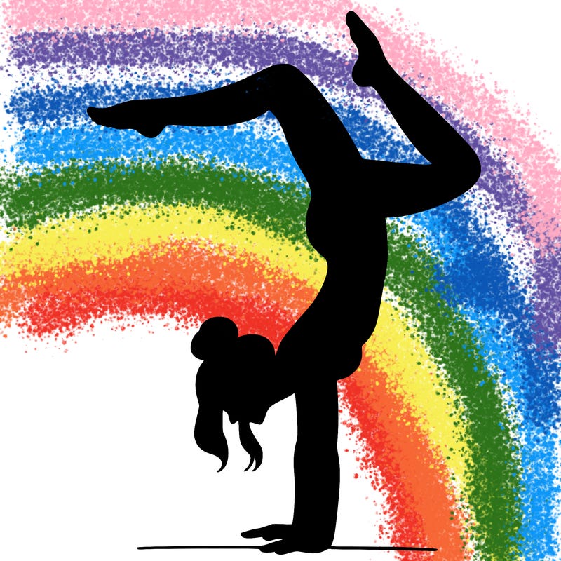 a woman doing a handstand