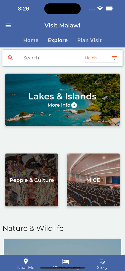 Erkunden-Bildschirm der Visit Malawi App mit Reisekategorien wie Seen und Inseln sowie Menschen und Kultur