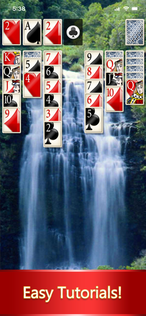 Solitaire: Deluxe® Classic - Solitaire Deluxe Classic gameplay with EasyRead cards and waterfall background