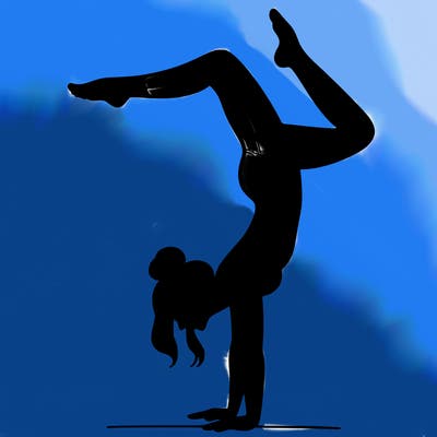 a woman doing a handstand