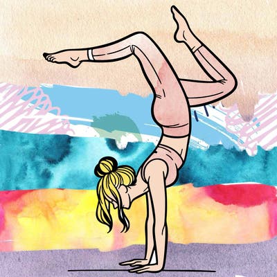 a woman doing a handstand