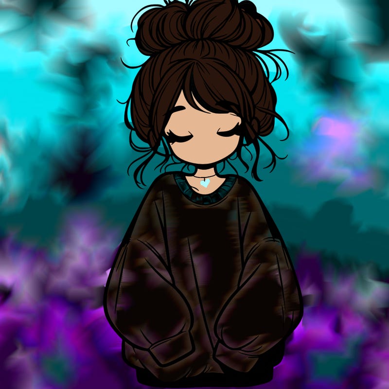 girl with baggy sweatshirt and messy bun