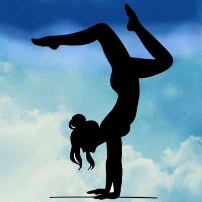 a woman doing a handstand