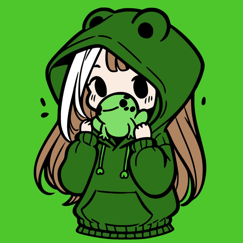 a girl holding a froggy hoodie