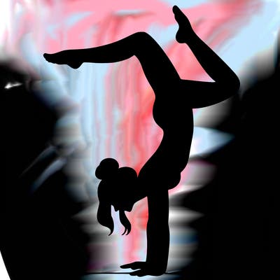 a woman doing a handstand