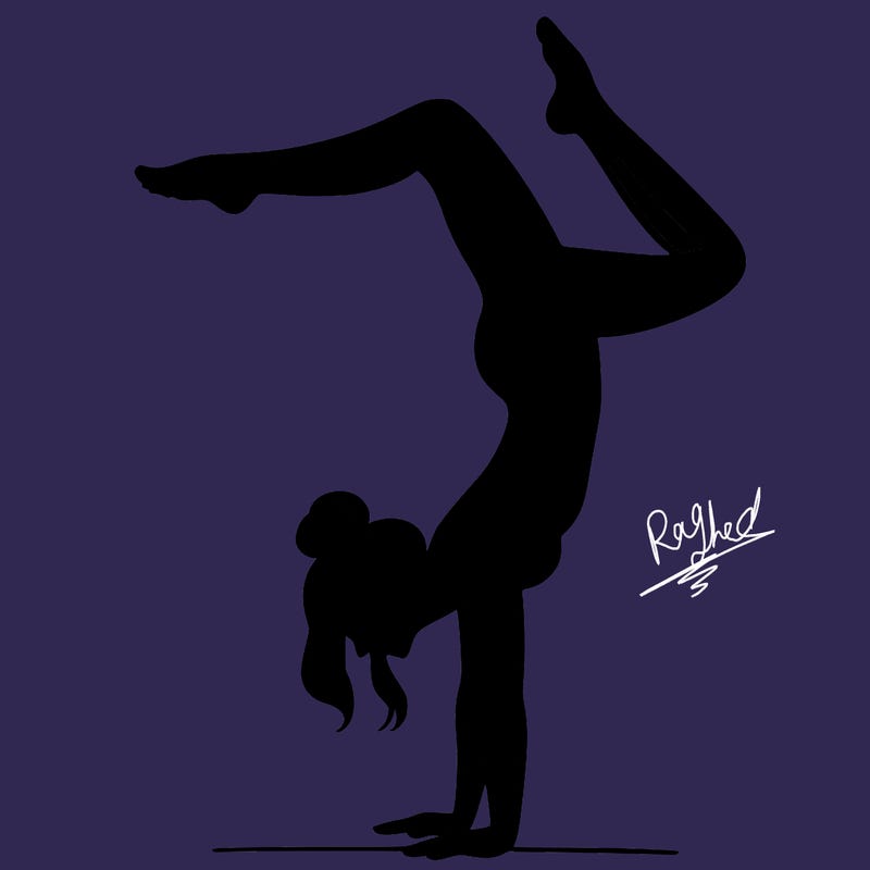 a woman doing a handstand