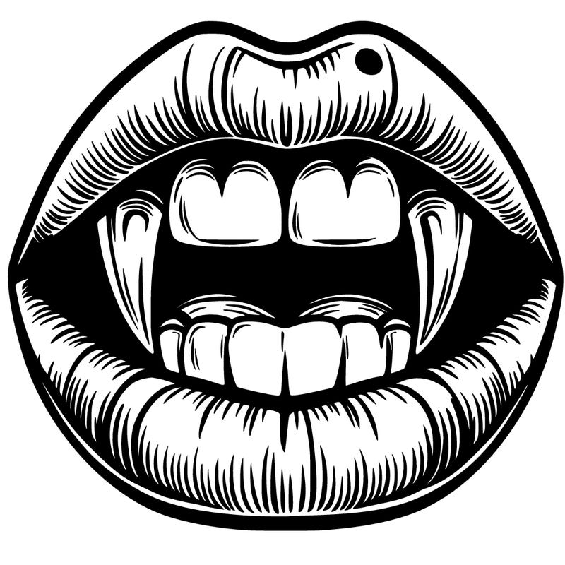 lips with vampire teeth