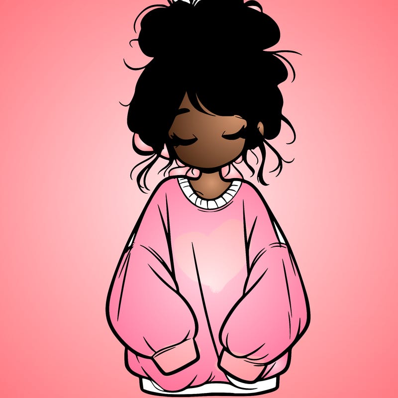 girl with baggy sweatshirt and messy bun