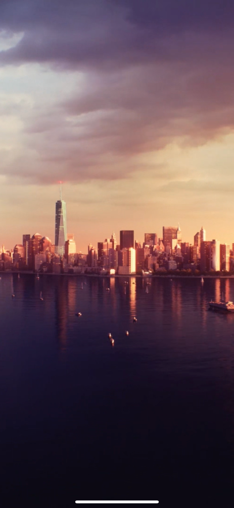 Statue of Liberty - Sunset panorama of the New York City skyline including One World Trade Center