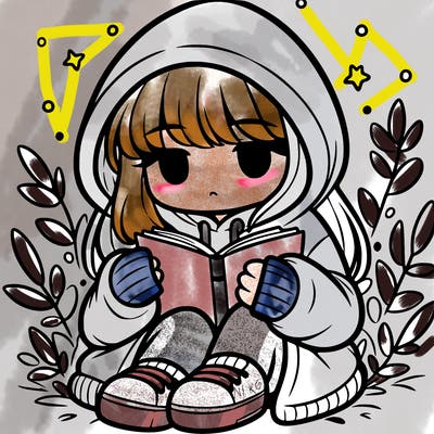 girl in oversized hoodie reading a book