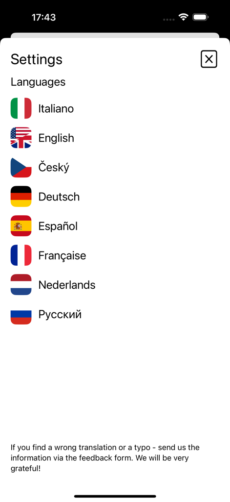 Language selection menu in the mushroom identification app showing various language options with flag icons