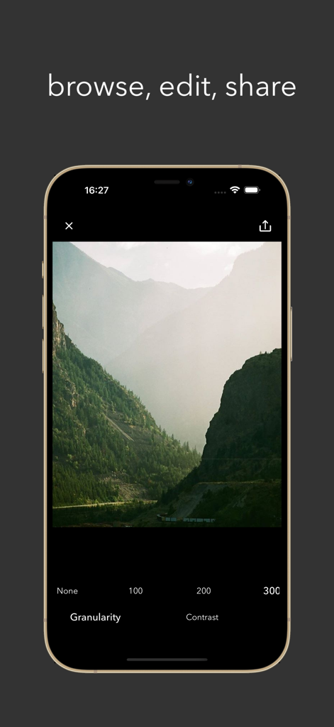 Interface of Analog Cam app showing photo editing tools for granularity and contrast on a vintage style mountain landscape photo.