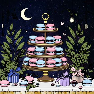 macaron display on a beautiful elegant table with eucalyptus leaves around it and small trinkets