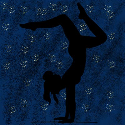a woman doing a handstand