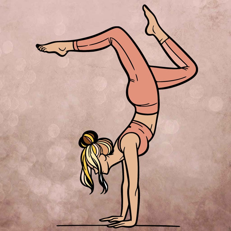 a woman doing a handstand