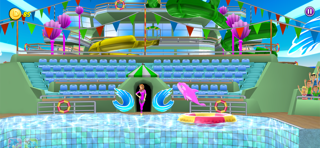 My Dolphin Show - A pink dolphin jumping through a colorful ring in a stadium pool with a trainer nearby.