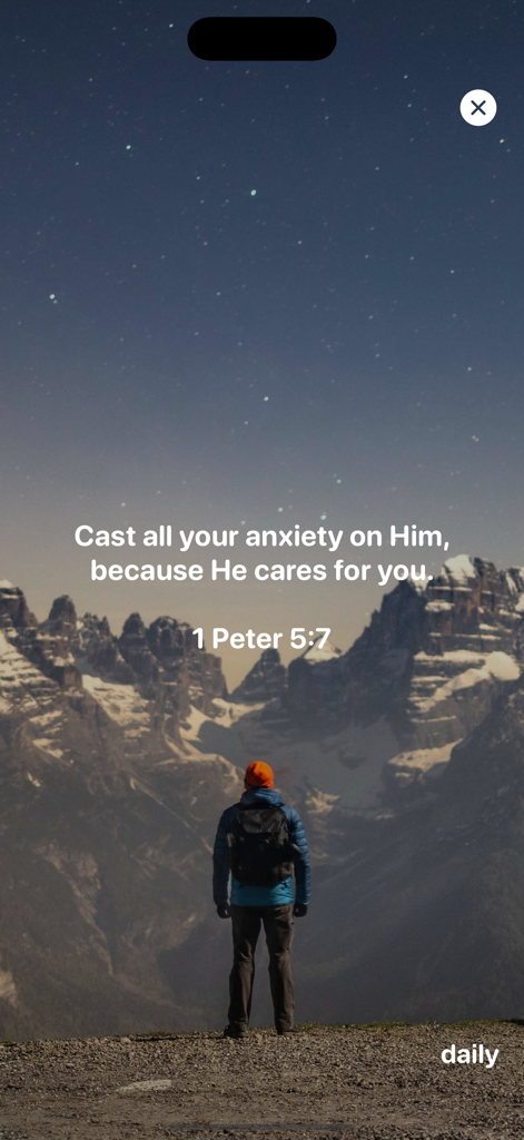 Daily Bible Verse & Motivation - Bible verse 1 Peter 5 7 displayed over a person standing before mountains under a starry night sky