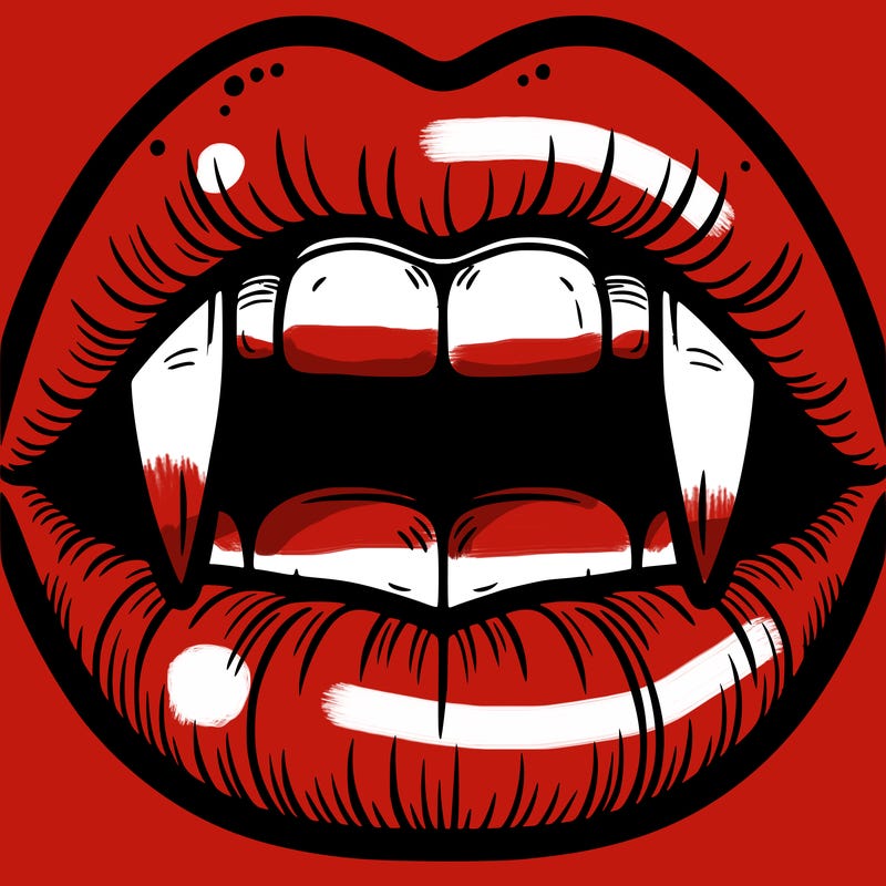 lips with vampire teeth