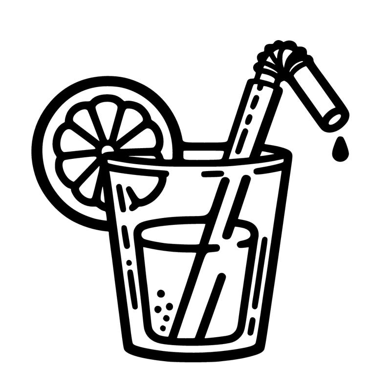 a glass with a straw and a slice of orange