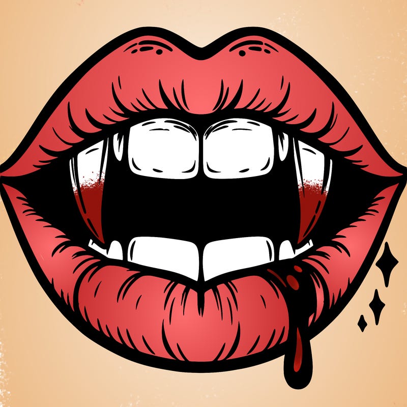 lips with vampire teeth