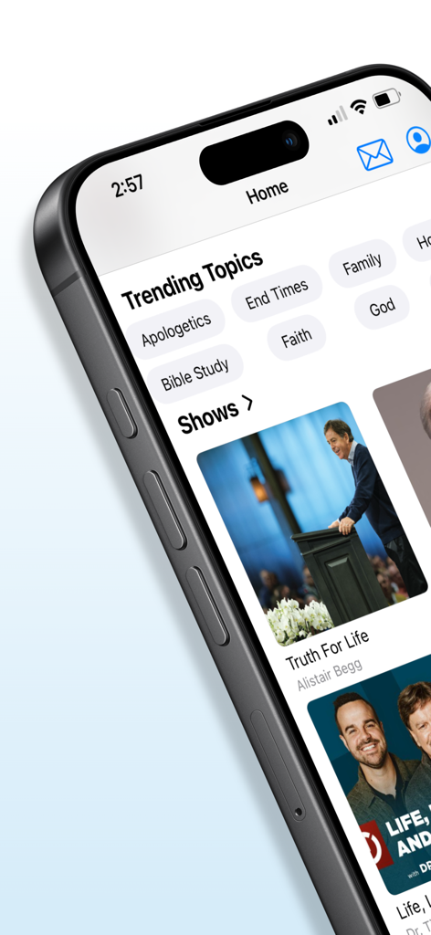 Screenshot of the OnePlace app home screen showing trending Christian topics and podcast shows