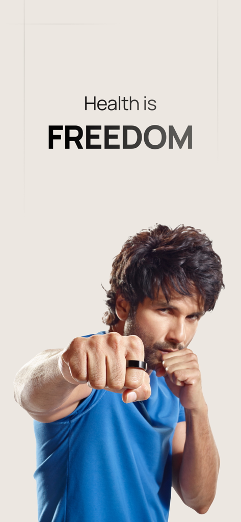A man in a boxing pose wearing a FITTR HART smart ring with the text Health is Freedom.