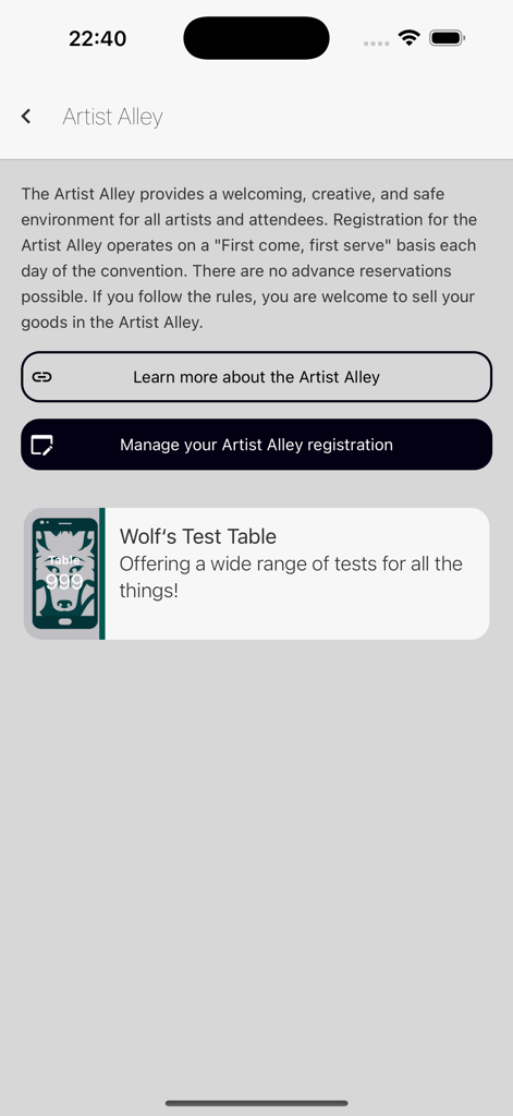 Artist Alley screen in the Eurofurence app showing registration information and a sample artist table