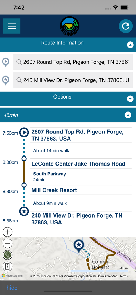 Gatlinburg Trolleys - Smartphone screen of the Gatlinburg Trolleys app displaying a detailed transit route with walking directions and trolley times in Pigeon Forge.