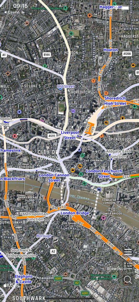 Satellite view of London showing detailed railway tracks and station locations in the Railways Map app