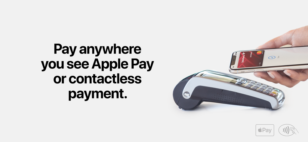 Apple Wallet - 小売店の端末でApple Payを使用して非接触決済を行うiPhoneユーザー