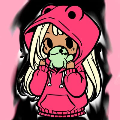 a girl holding a froggy hoodie