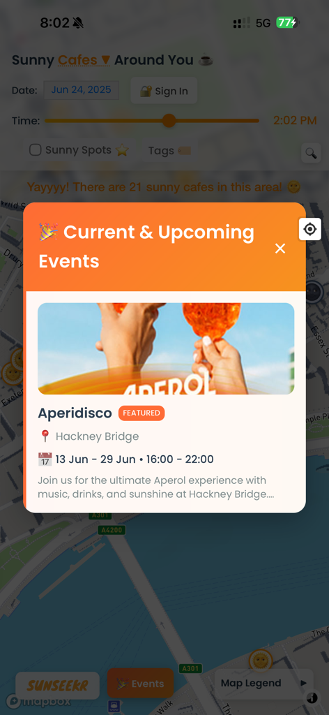 A screenshot of the SunSeekr mobile app displaying a featured outdoor event pop-up over a map of sunny cafe locations.