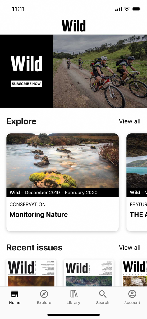 Home screen of the Wild wilderness adventure magazine app featuring mountain biking and nature conservation articles