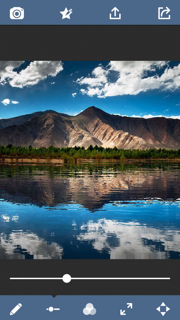 Mountain landscape with a mirror water reflection effect being edited in a mobile app interface