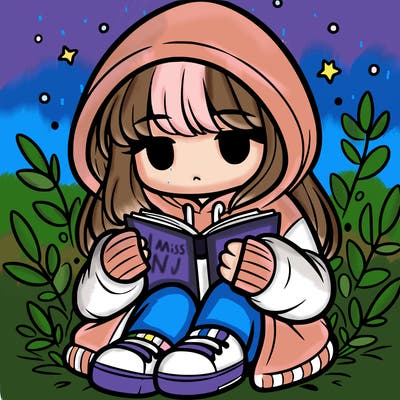 girl in oversized hoodie reading a book